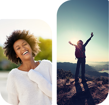 01 A woman is smiling and standing on top of a hill.